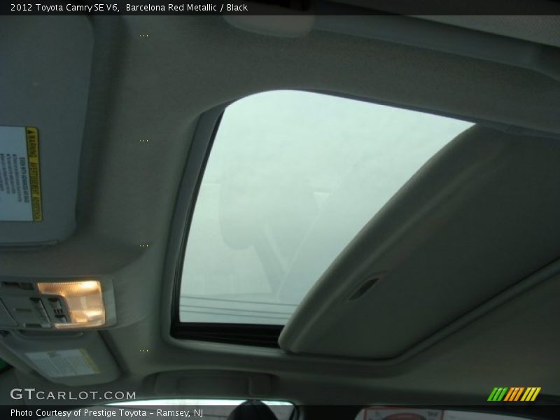 Barcelona Red Metallic / Black 2012 Toyota Camry SE V6