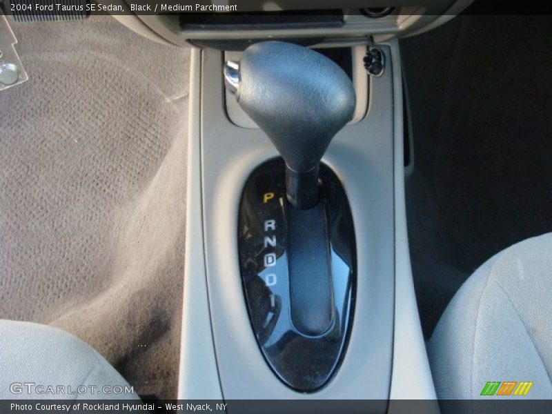 Black / Medium Parchment 2004 Ford Taurus SE Sedan