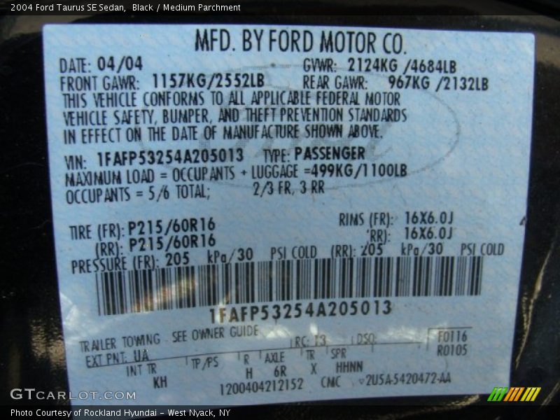 Black / Medium Parchment 2004 Ford Taurus SE Sedan