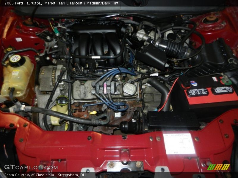 Merlot Pearl Clearcoat / Medium/Dark Flint 2005 Ford Taurus SE
