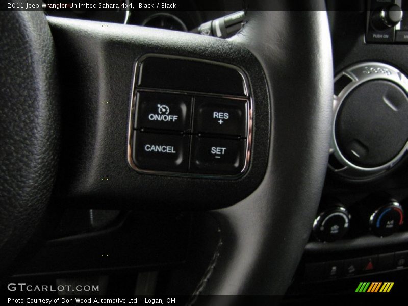 Black / Black 2011 Jeep Wrangler Unlimited Sahara 4x4