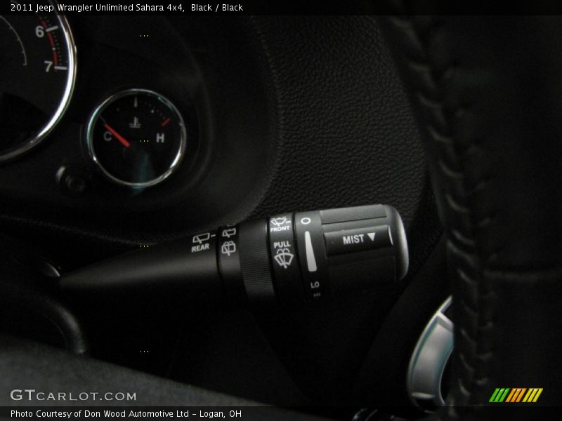 Black / Black 2011 Jeep Wrangler Unlimited Sahara 4x4