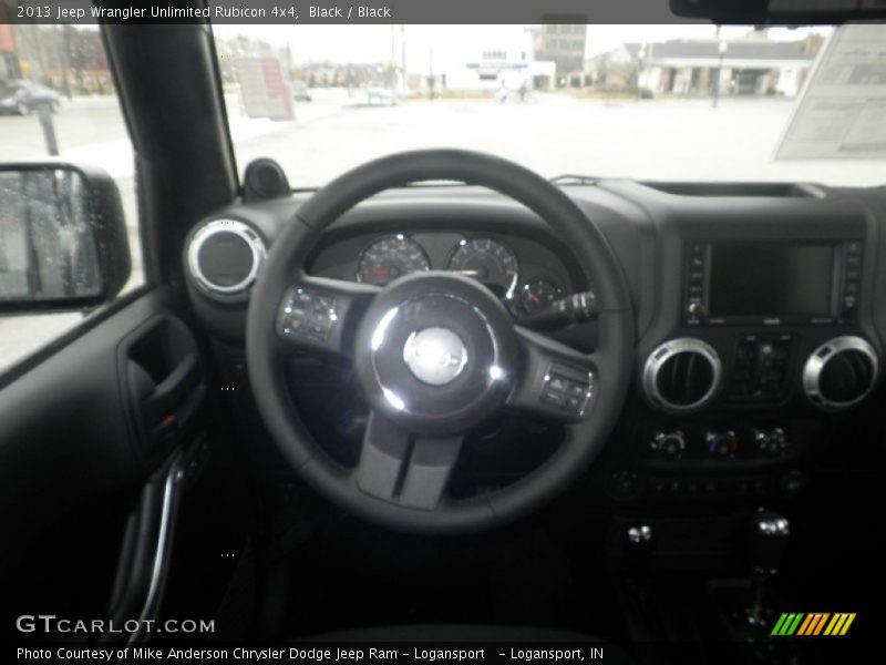 Black / Black 2013 Jeep Wrangler Unlimited Rubicon 4x4