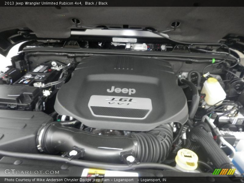 Black / Black 2013 Jeep Wrangler Unlimited Rubicon 4x4