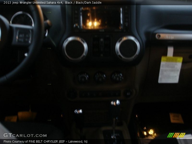 Black / Black/Dark Saddle 2013 Jeep Wrangler Unlimited Sahara 4x4