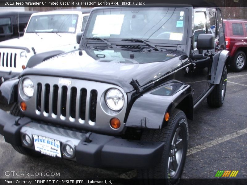 Black / Black 2013 Jeep Wrangler Unlimited Oscar Mike Freedom Edition 4x4