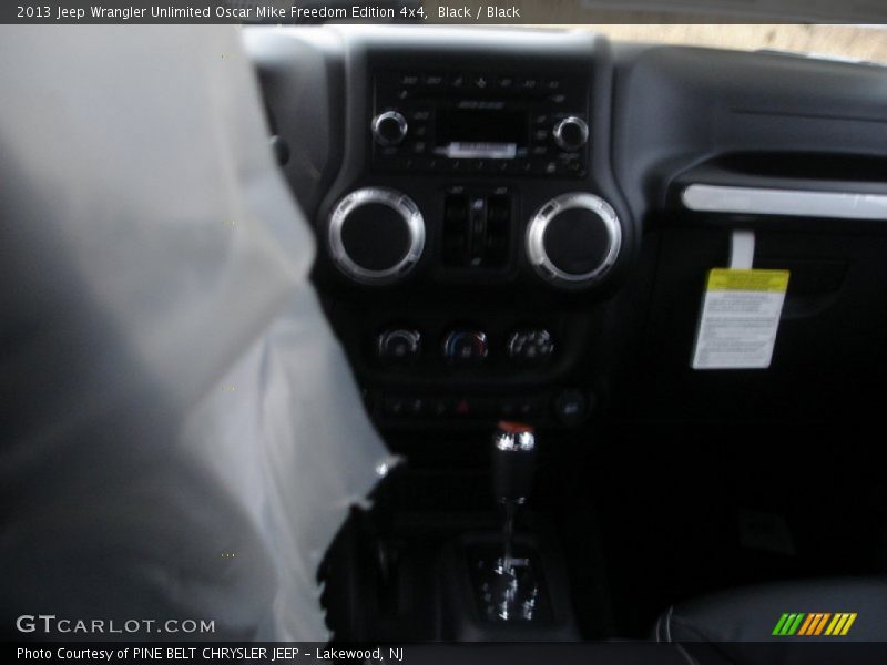 Black / Black 2013 Jeep Wrangler Unlimited Oscar Mike Freedom Edition 4x4