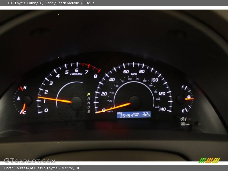 Sandy Beach Metallic / Bisque 2010 Toyota Camry LE