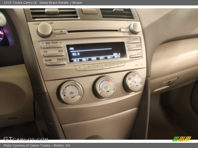 Sandy Beach Metallic / Bisque 2010 Toyota Camry LE