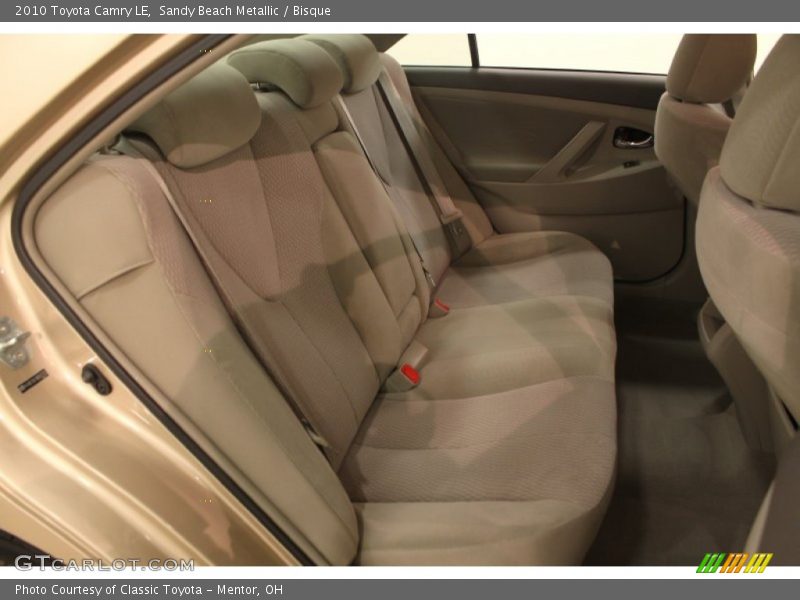 Sandy Beach Metallic / Bisque 2010 Toyota Camry LE