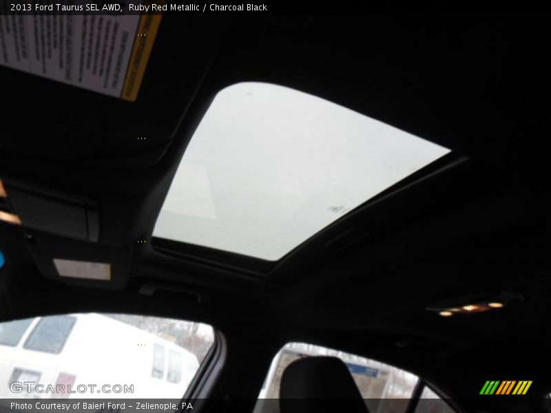 Ruby Red Metallic / Charcoal Black 2013 Ford Taurus SEL AWD
