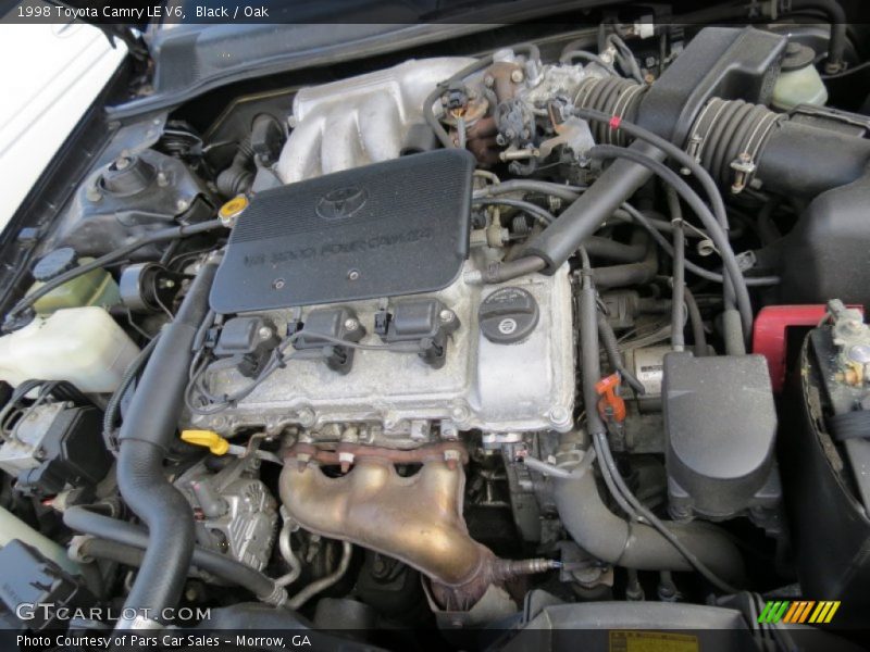 Black / Oak 1998 Toyota Camry LE V6
