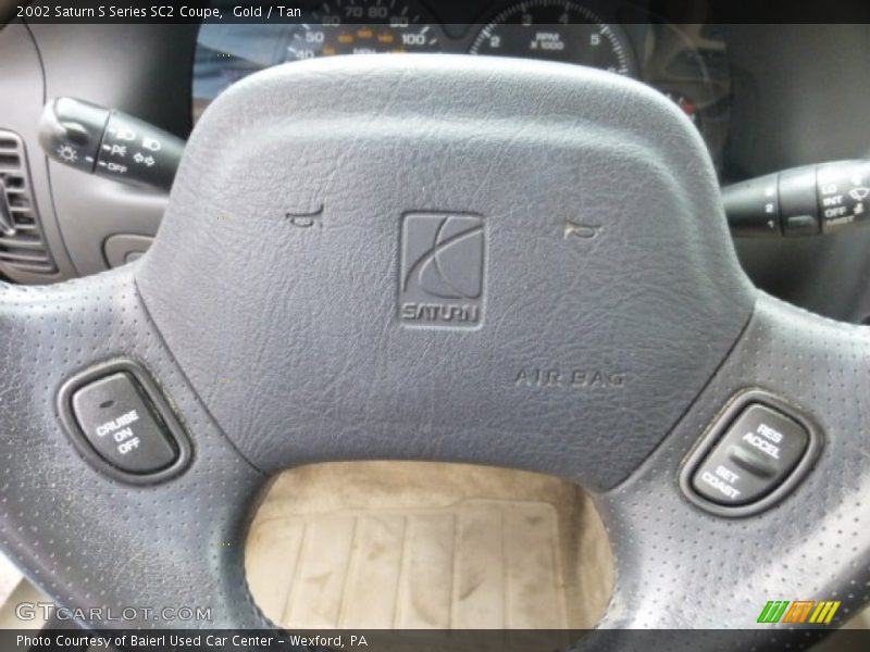 Gold / Tan 2002 Saturn S Series SC2 Coupe