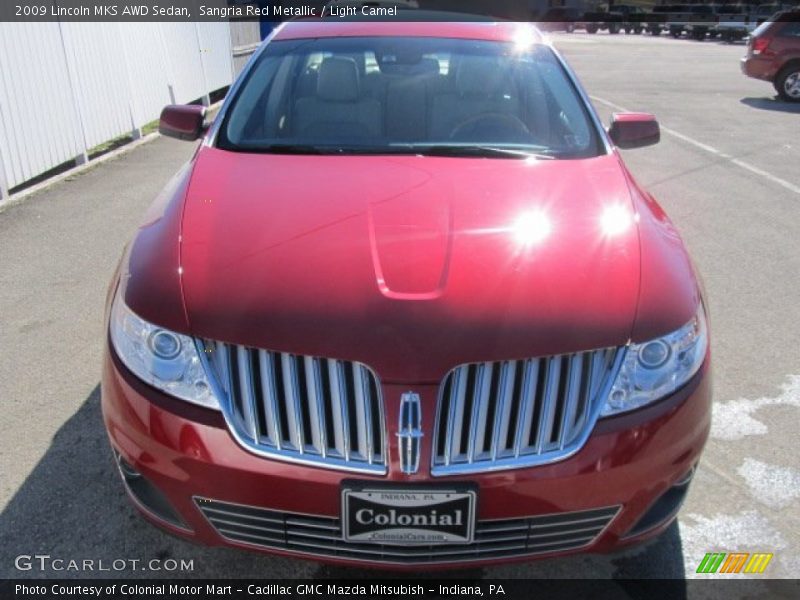 Sangria Red Metallic / Light Camel 2009 Lincoln MKS AWD Sedan