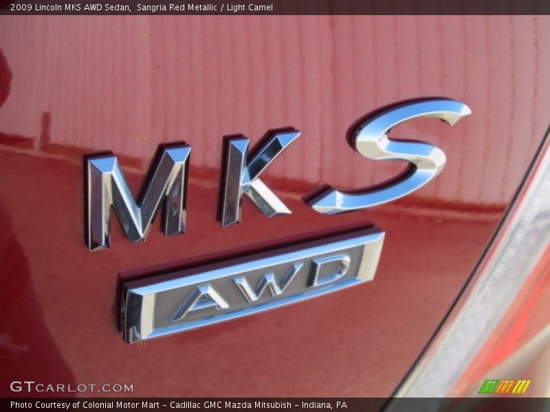 Sangria Red Metallic / Light Camel 2009 Lincoln MKS AWD Sedan