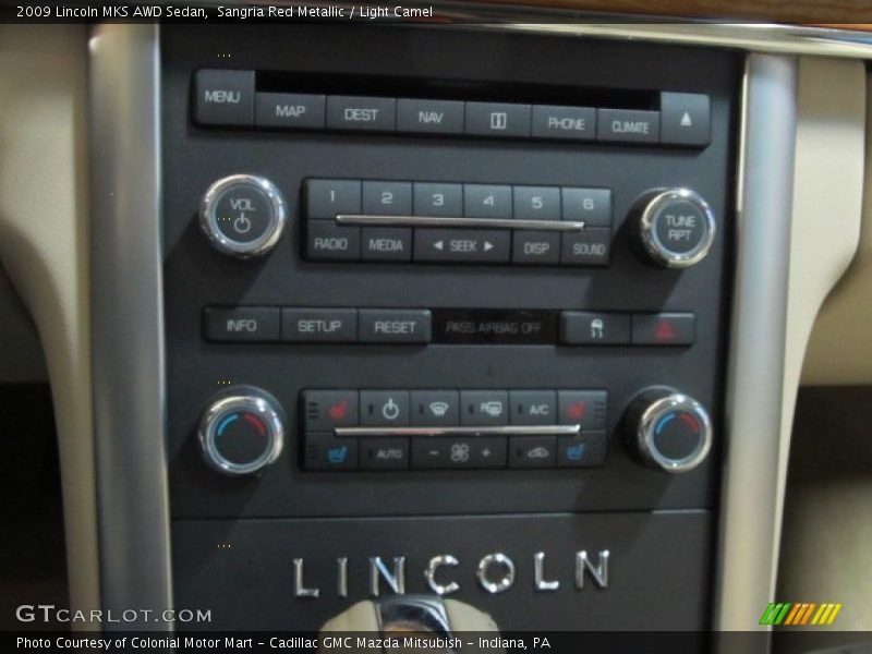 Sangria Red Metallic / Light Camel 2009 Lincoln MKS AWD Sedan