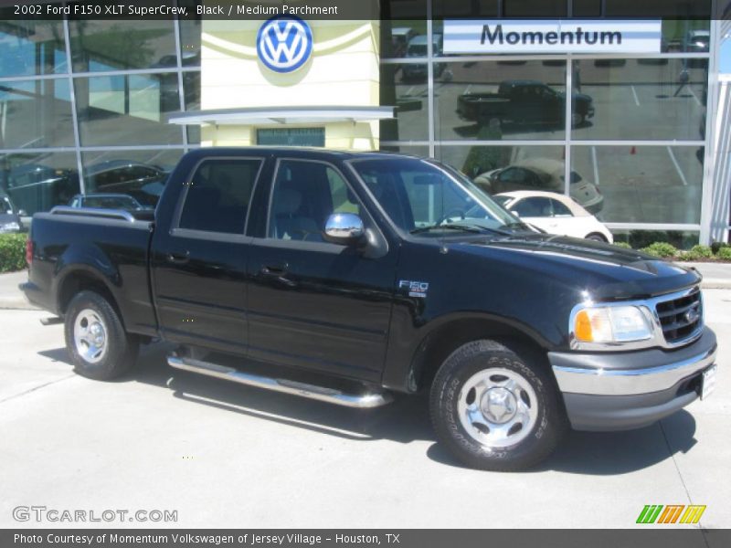 Black / Medium Parchment 2002 Ford F150 XLT SuperCrew