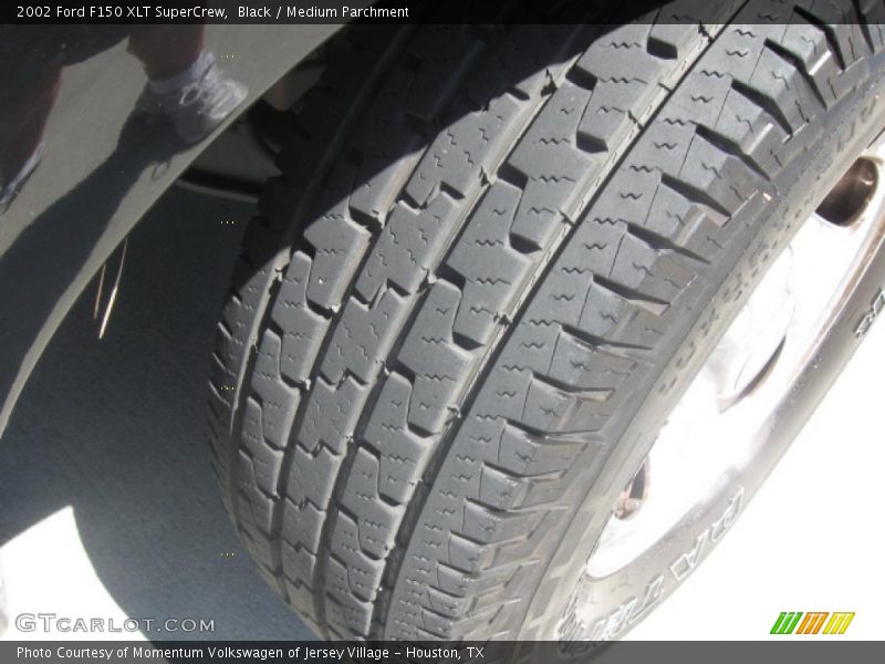 Black / Medium Parchment 2002 Ford F150 XLT SuperCrew