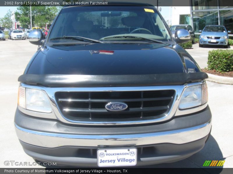 Black / Medium Parchment 2002 Ford F150 XLT SuperCrew