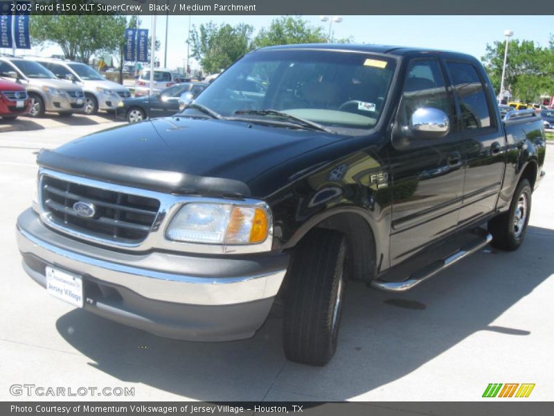 Black / Medium Parchment 2002 Ford F150 XLT SuperCrew