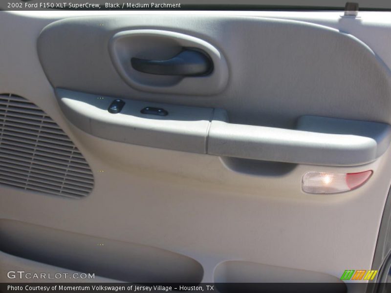 Black / Medium Parchment 2002 Ford F150 XLT SuperCrew