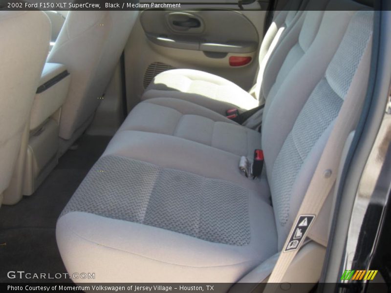 Black / Medium Parchment 2002 Ford F150 XLT SuperCrew
