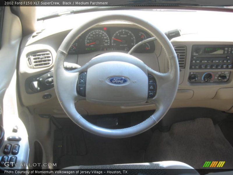 Black / Medium Parchment 2002 Ford F150 XLT SuperCrew