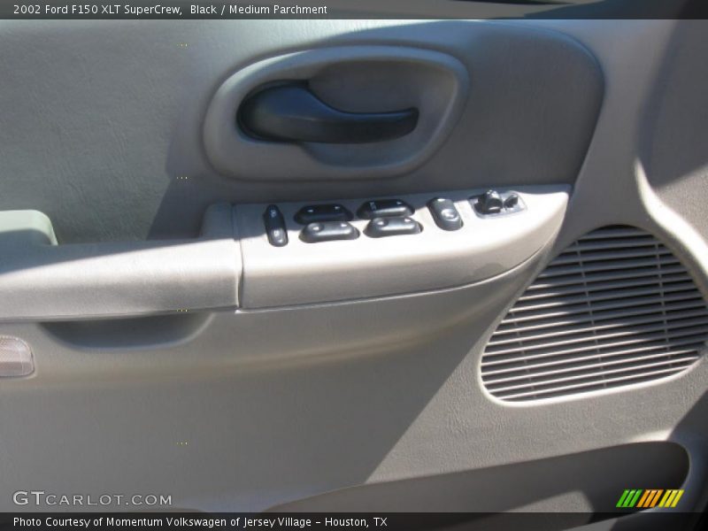 Black / Medium Parchment 2002 Ford F150 XLT SuperCrew