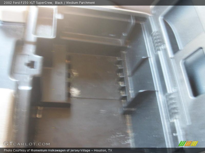 Black / Medium Parchment 2002 Ford F150 XLT SuperCrew
