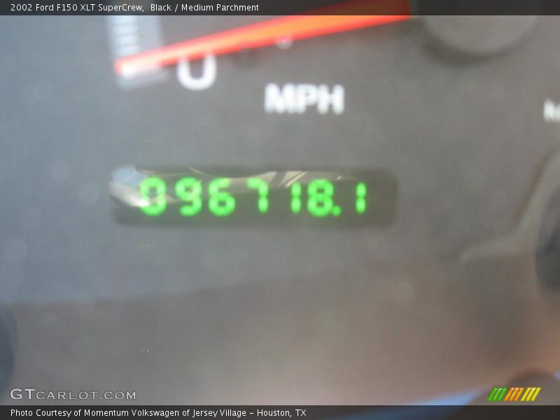 Black / Medium Parchment 2002 Ford F150 XLT SuperCrew