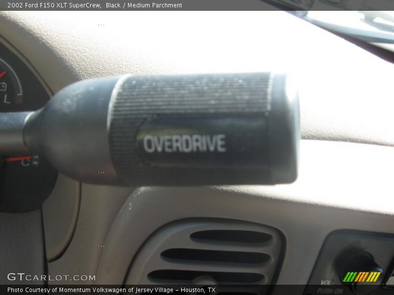 Black / Medium Parchment 2002 Ford F150 XLT SuperCrew