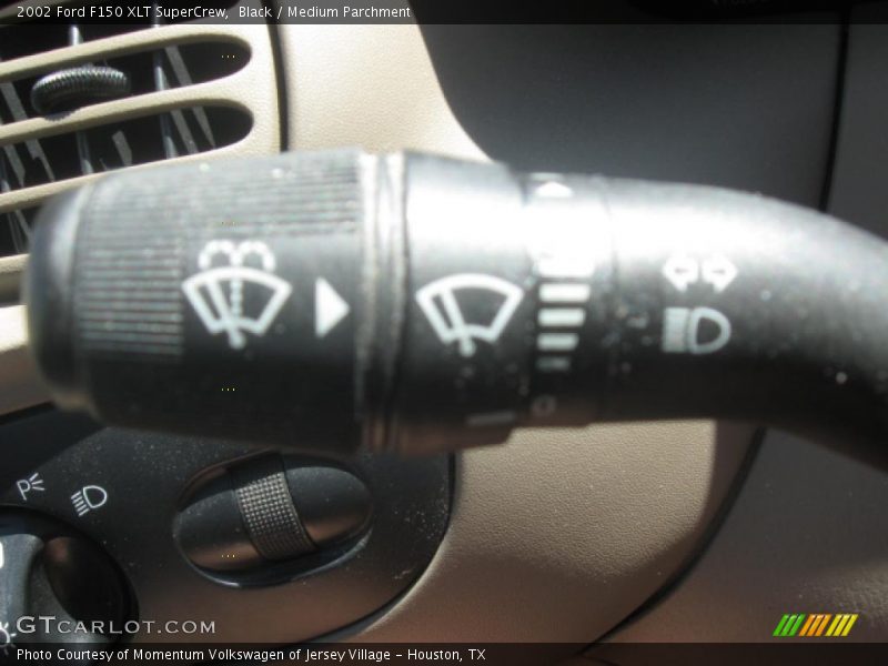 Black / Medium Parchment 2002 Ford F150 XLT SuperCrew