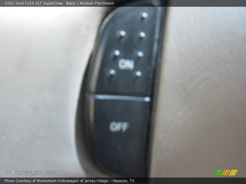 Black / Medium Parchment 2002 Ford F150 XLT SuperCrew