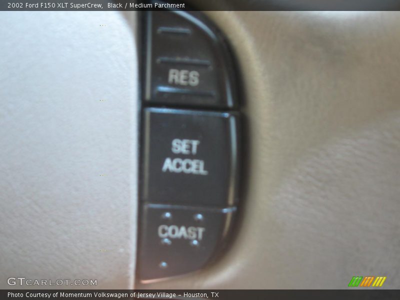 Black / Medium Parchment 2002 Ford F150 XLT SuperCrew
