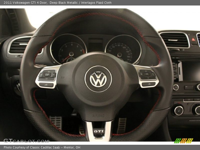 Deep Black Metallic / Interlagos Plaid Cloth 2011 Volkswagen GTI 4 Door