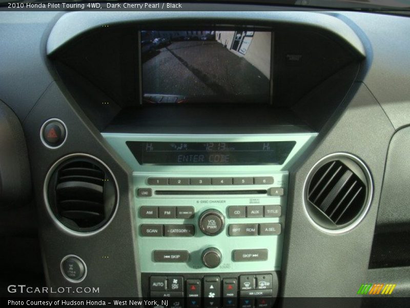 Dark Cherry Pearl / Black 2010 Honda Pilot Touring 4WD