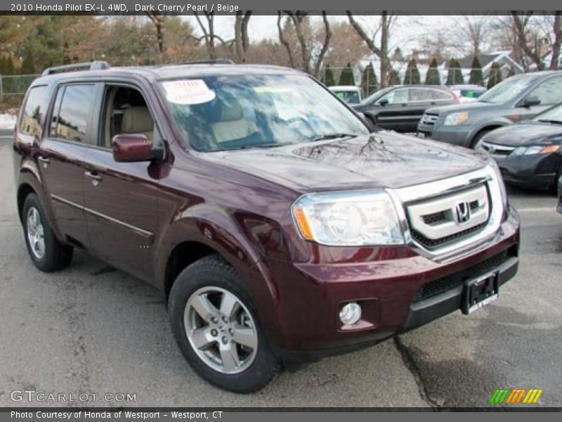 Dark Cherry Pearl / Beige 2010 Honda Pilot EX-L 4WD