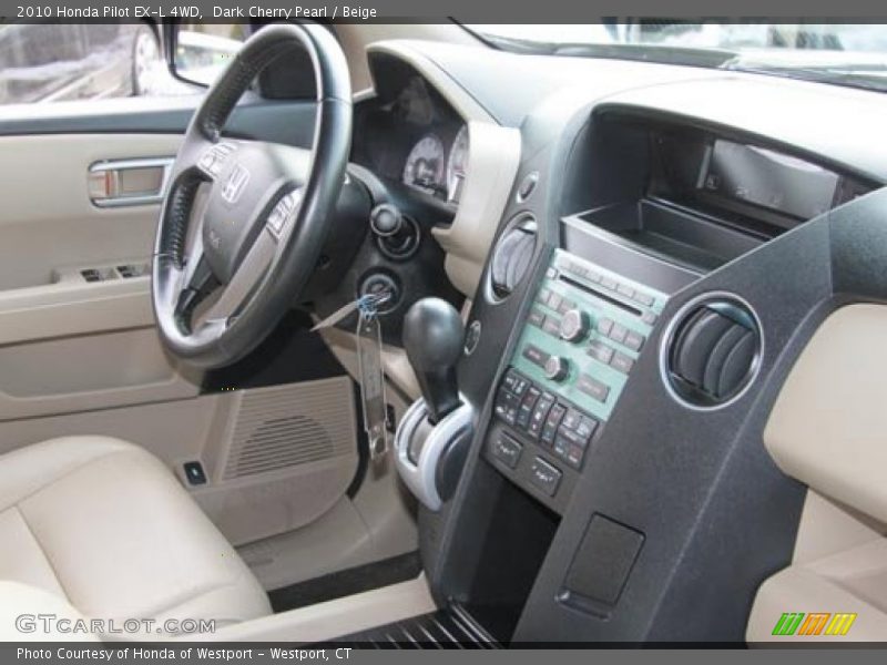 Dark Cherry Pearl / Beige 2010 Honda Pilot EX-L 4WD