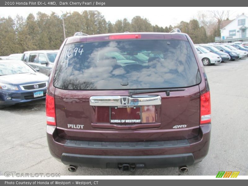 Dark Cherry Pearl / Beige 2010 Honda Pilot EX-L 4WD