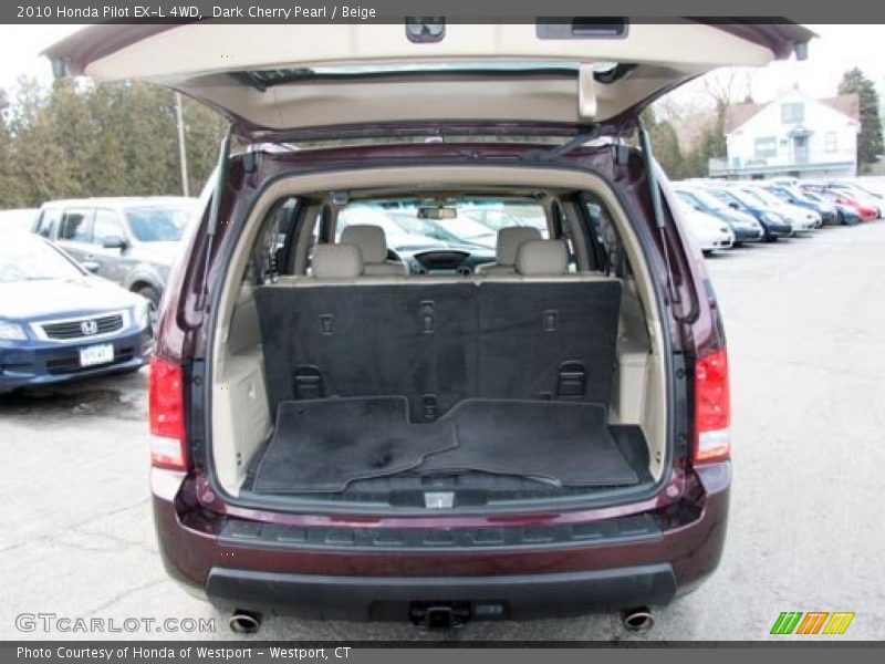 Dark Cherry Pearl / Beige 2010 Honda Pilot EX-L 4WD