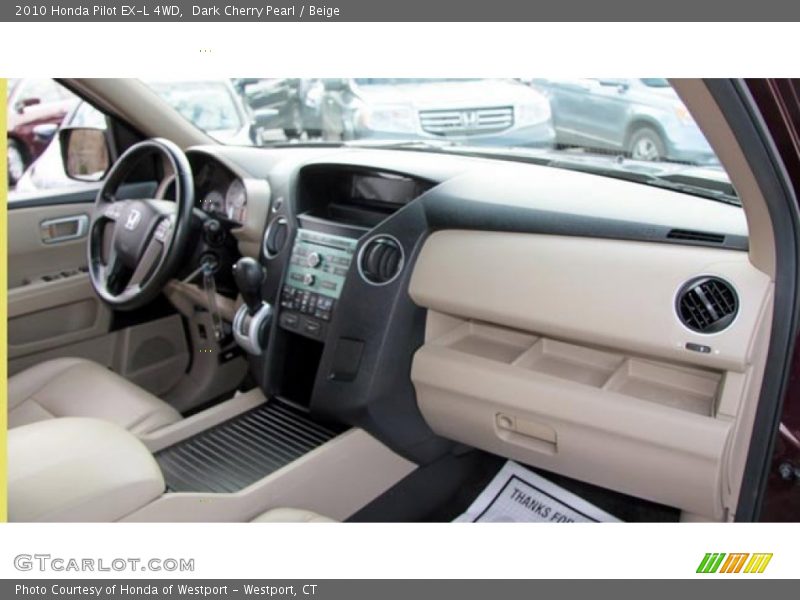Dark Cherry Pearl / Beige 2010 Honda Pilot EX-L 4WD