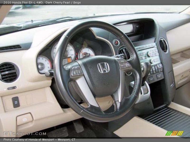 Dark Cherry Pearl / Beige 2010 Honda Pilot EX-L 4WD