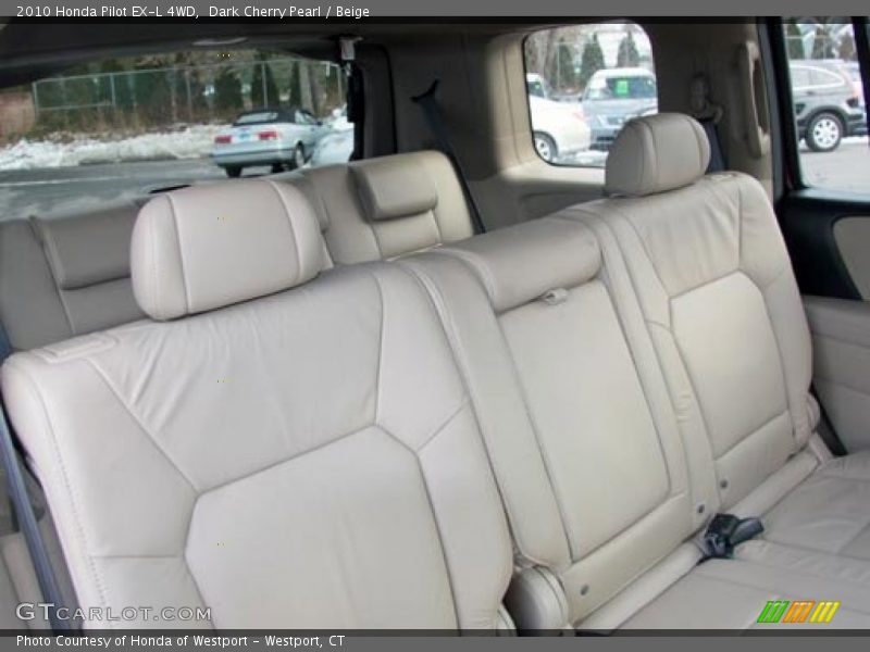 Dark Cherry Pearl / Beige 2010 Honda Pilot EX-L 4WD