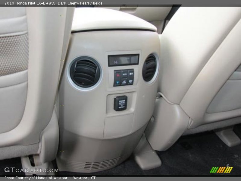 Dark Cherry Pearl / Beige 2010 Honda Pilot EX-L 4WD