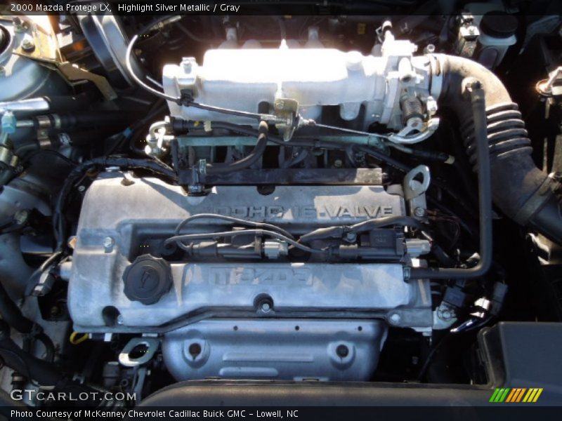 Highlight Silver Metallic / Gray 2000 Mazda Protege LX