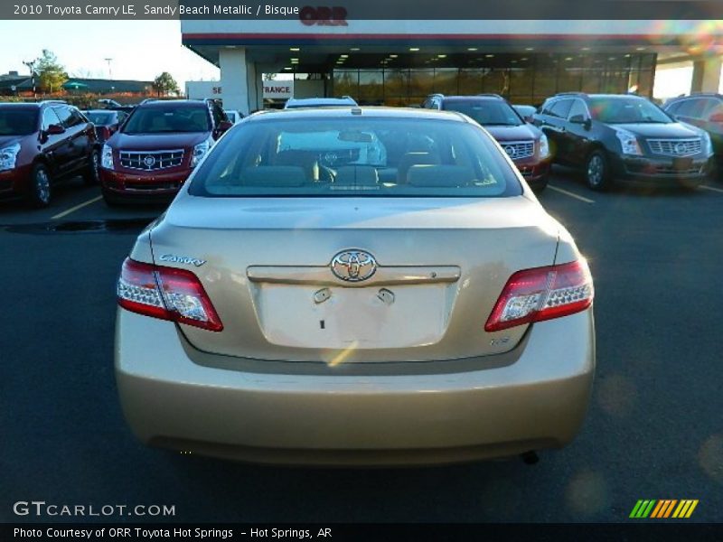 Sandy Beach Metallic / Bisque 2010 Toyota Camry LE