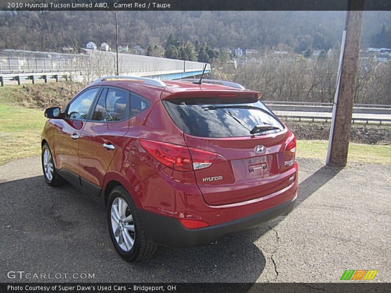 Garnet Red / Taupe 2010 Hyundai Tucson Limited AWD