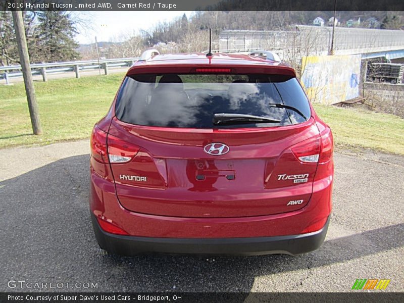 Garnet Red / Taupe 2010 Hyundai Tucson Limited AWD