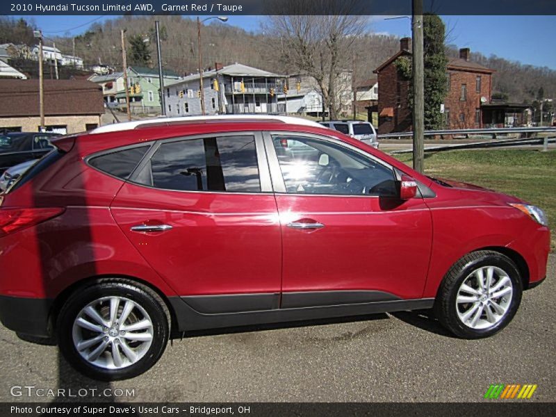 Garnet Red / Taupe 2010 Hyundai Tucson Limited AWD