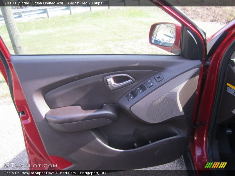 Garnet Red / Taupe 2010 Hyundai Tucson Limited AWD
